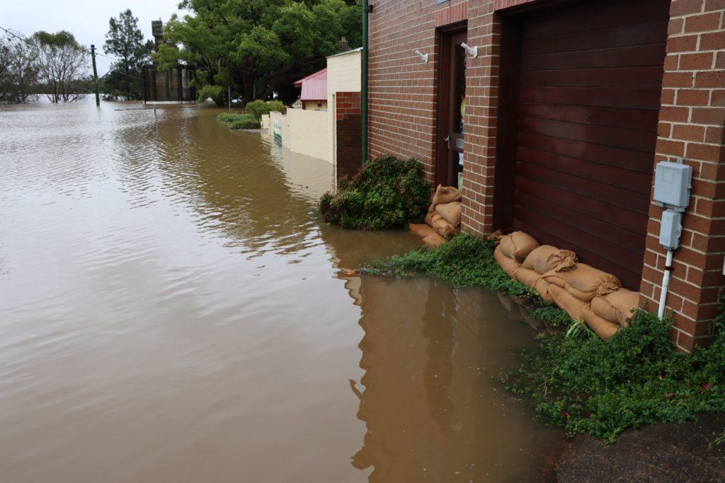 how to prepare your home for a tsunami, flooded street