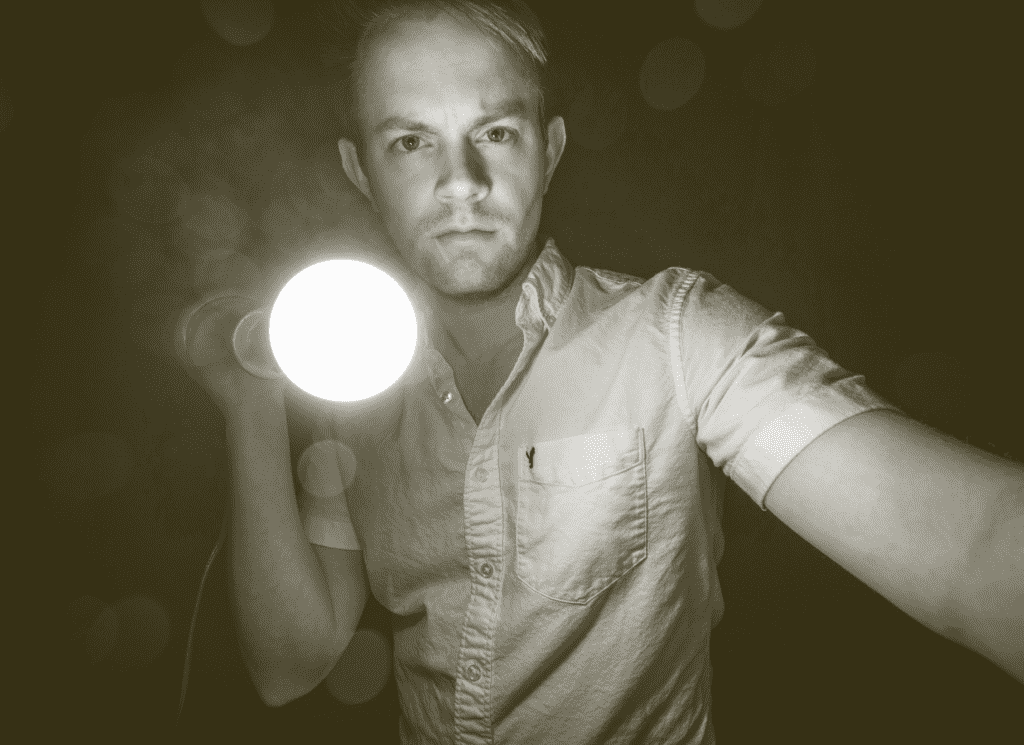 Man with flashlight