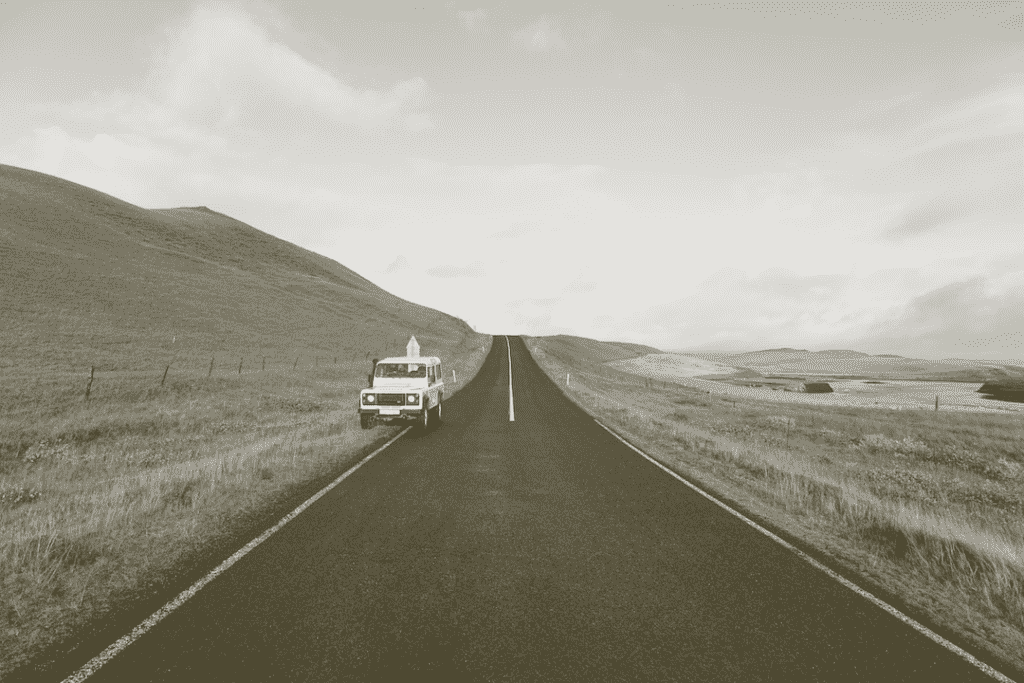Car parked on the side of rural road
