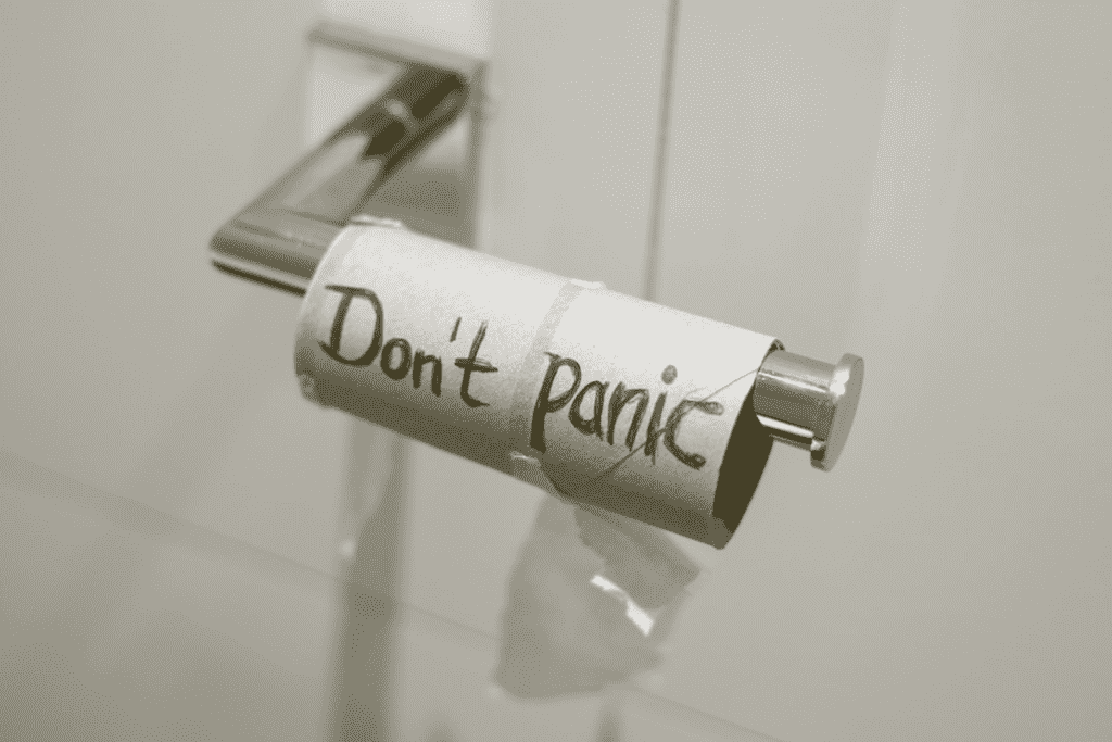Empty toilet roll that says "Don't panic"