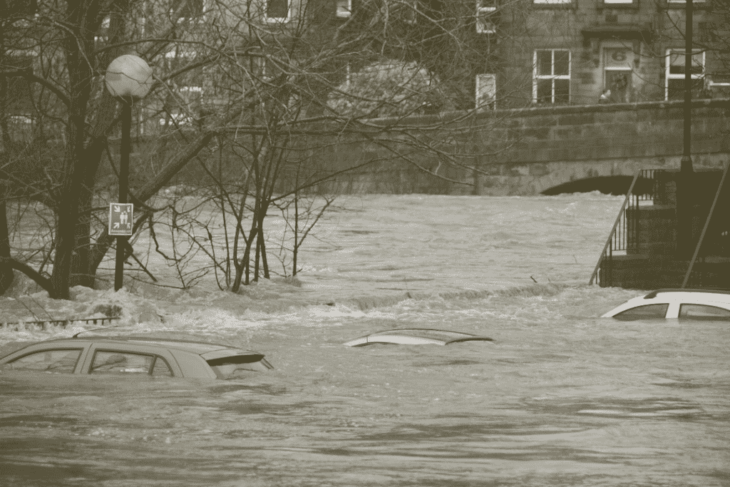 Flooded street with cars underwater