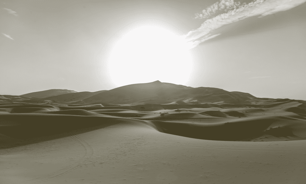 Sun over hot desert