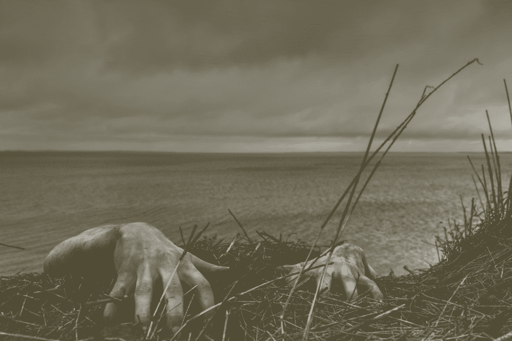 Zombie emerging from the ground, zombie apocalypse prep guide