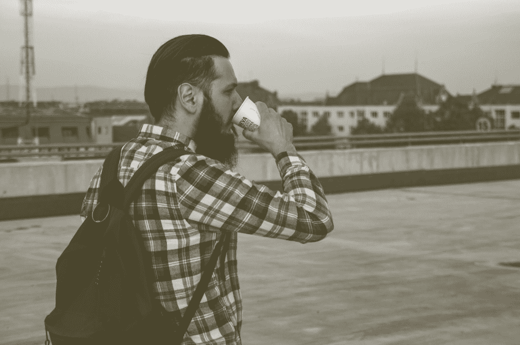 Man drinking a cup of coffee