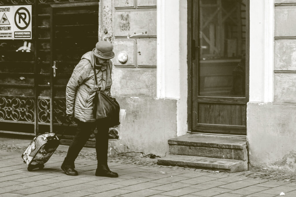 Sad elderly with minimal belongings